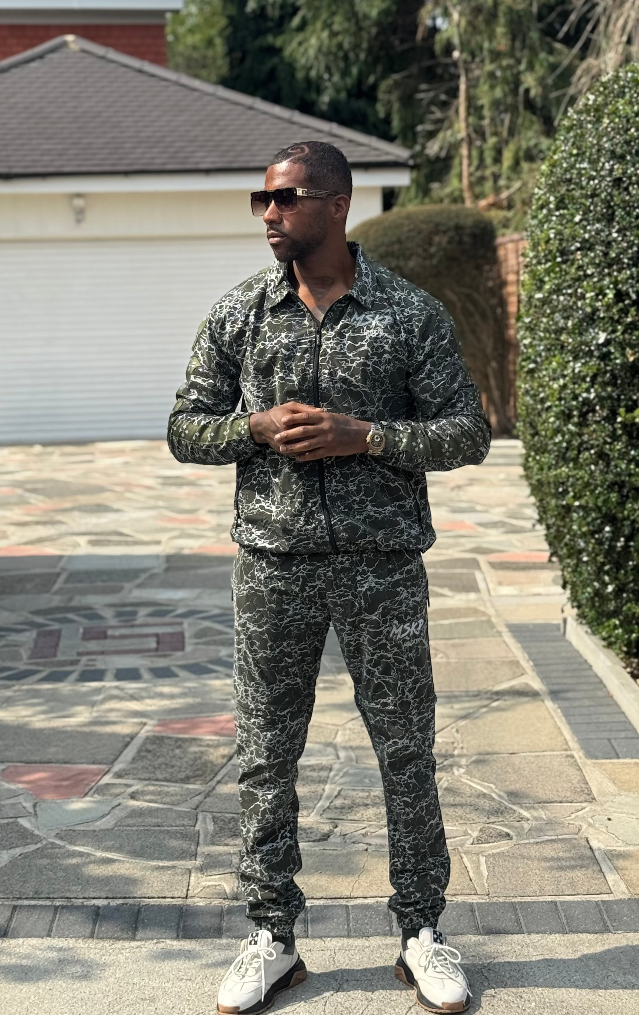 MSKP Marble Effect Shell Tracksuit
Command attention with this premium marble-effect shell tracksuit  a refined fusion of modern artistry and elevated streetwear desMSKP Marble Effect Shell Tracksuit