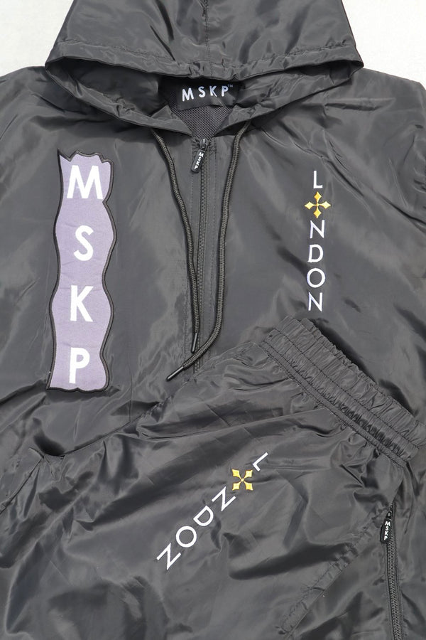 Black  jacket with branding on a white background