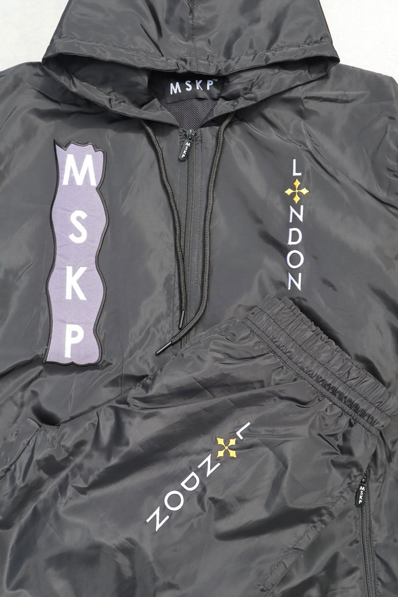 Black  jacket with branding on a white background