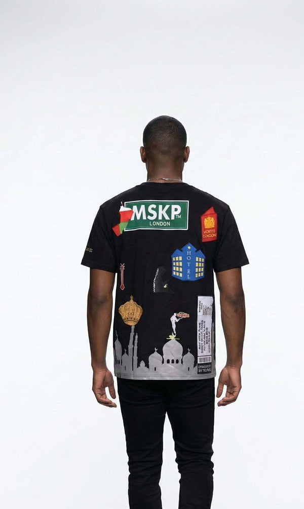 Man wearing MSKP Lost in Oman anime streetwear T-shirt