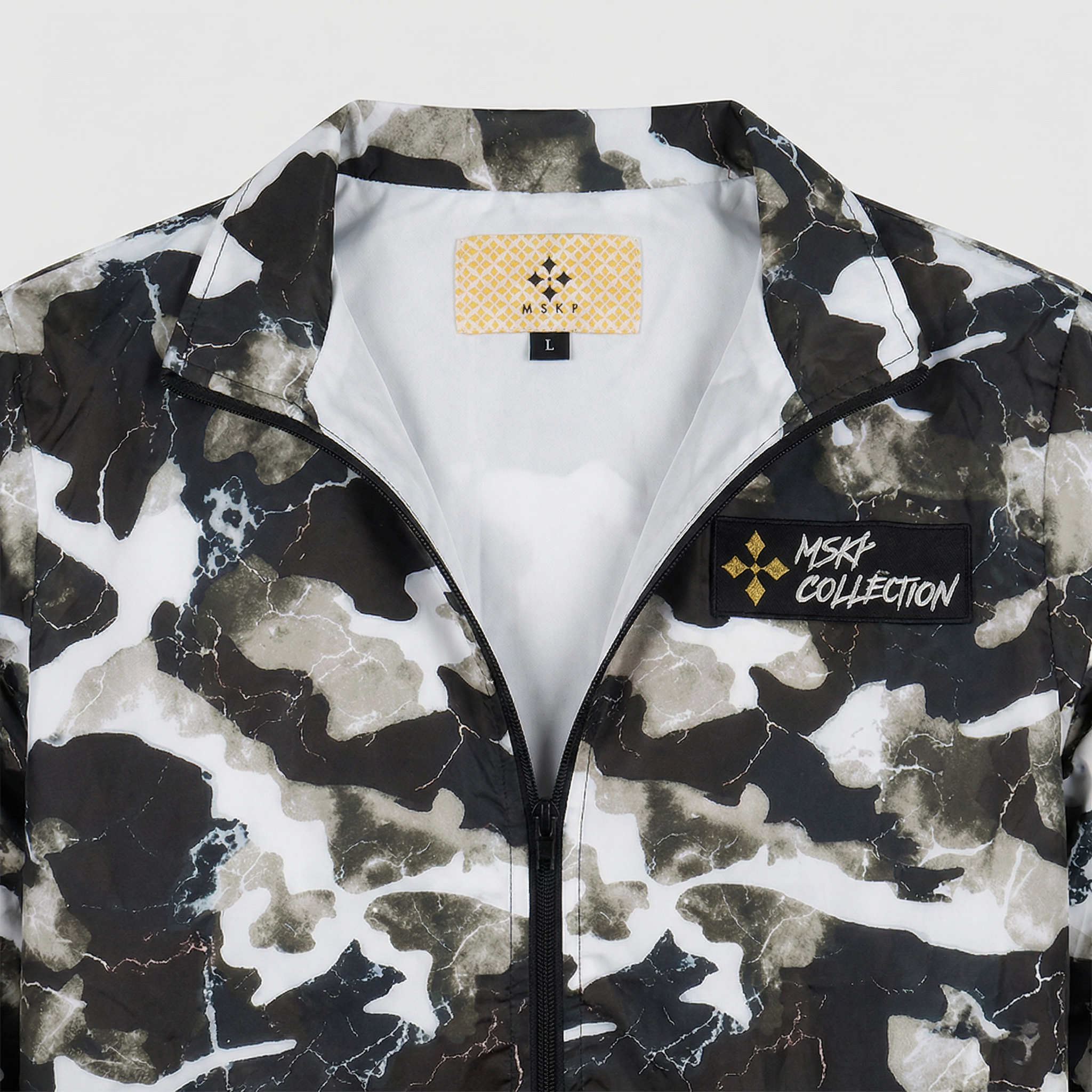 MSKP Luxury Camo Shell Tracksuit


 Experience elevated leisurewear with the MSKP refined tracksuit camo set — a statement ensemble crafted for individuals who move MSKP Luxury Camo Shell Tracksuit