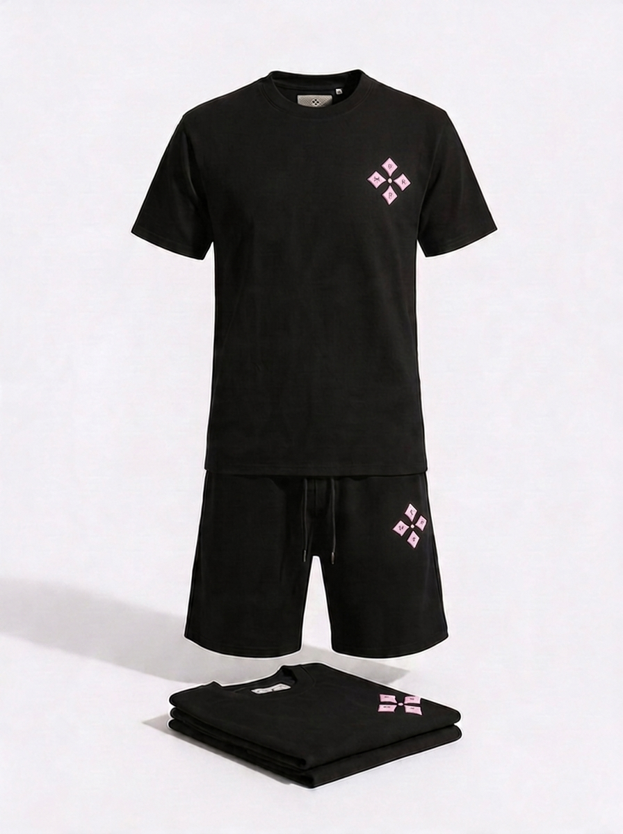 Man wearing MSKP Street to Elite Set streetwear outfit with bold back graphic in urban setting