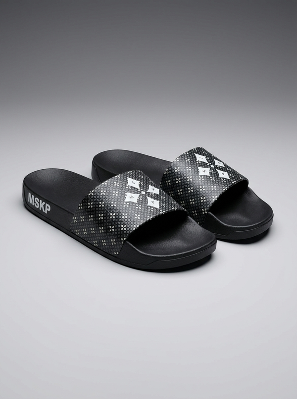Step into comfort and elevate your streetwear game with the new MSKP Patterned Sliders. Designed with purpose and built for everyday movement, these premium sliders MSKP Patterned Sliders