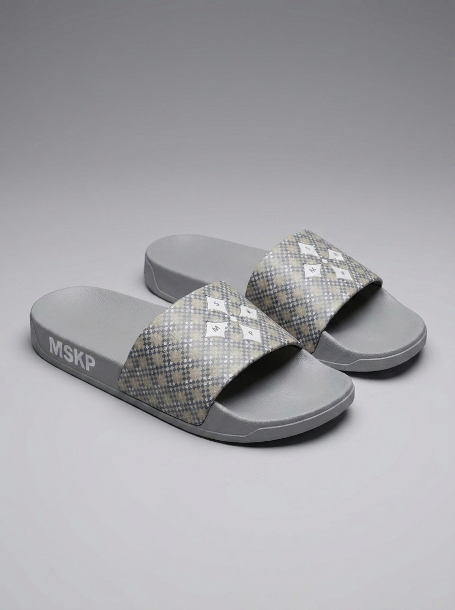 Step into comfort and elevate your streetwear game with the new MSKP Patterned Sliders. Designed with purpose and built for everyday movement, these premium sliders MSKP Patterned Sliders